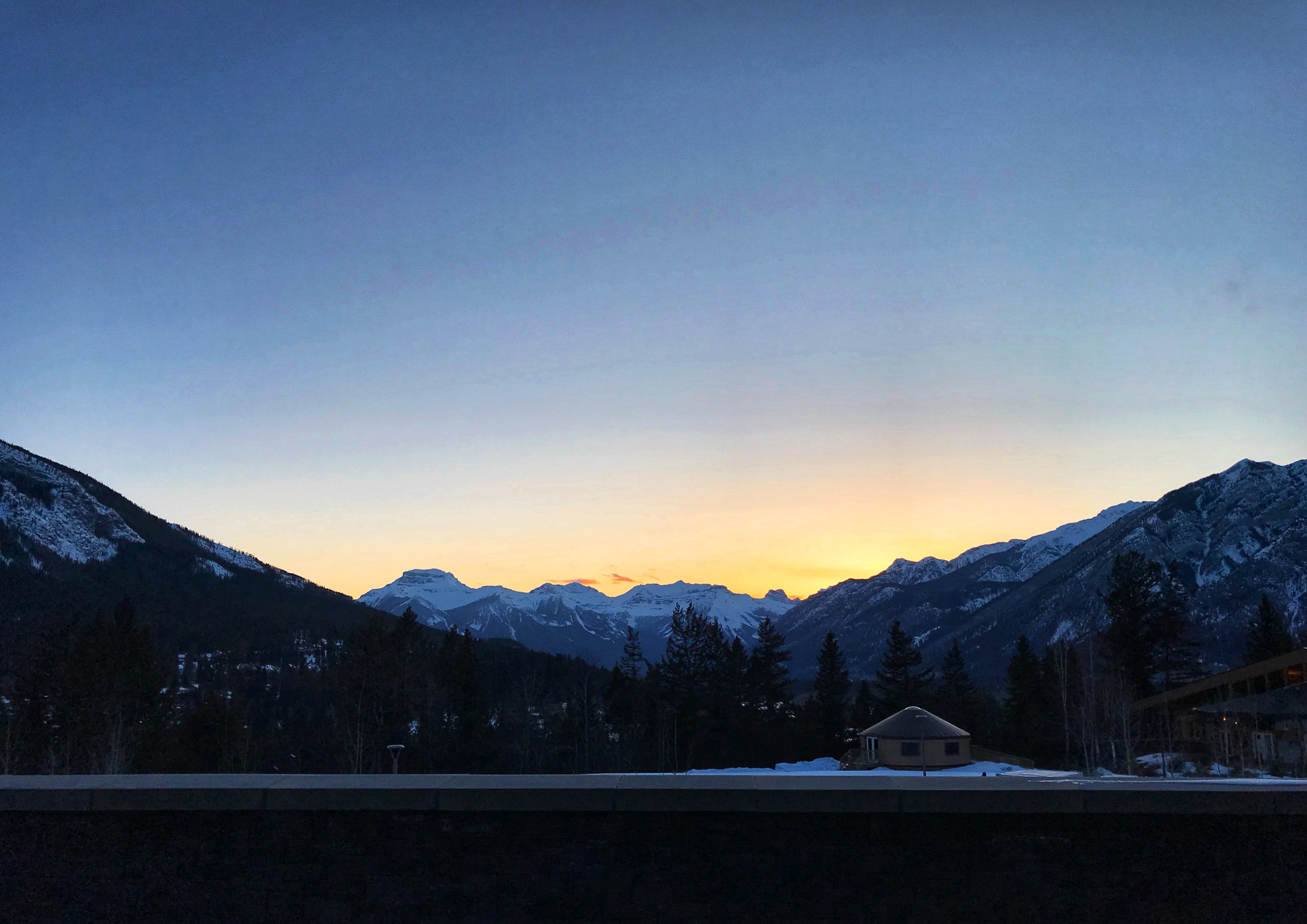 Sunset over the mountains as seen from the Banff Centre