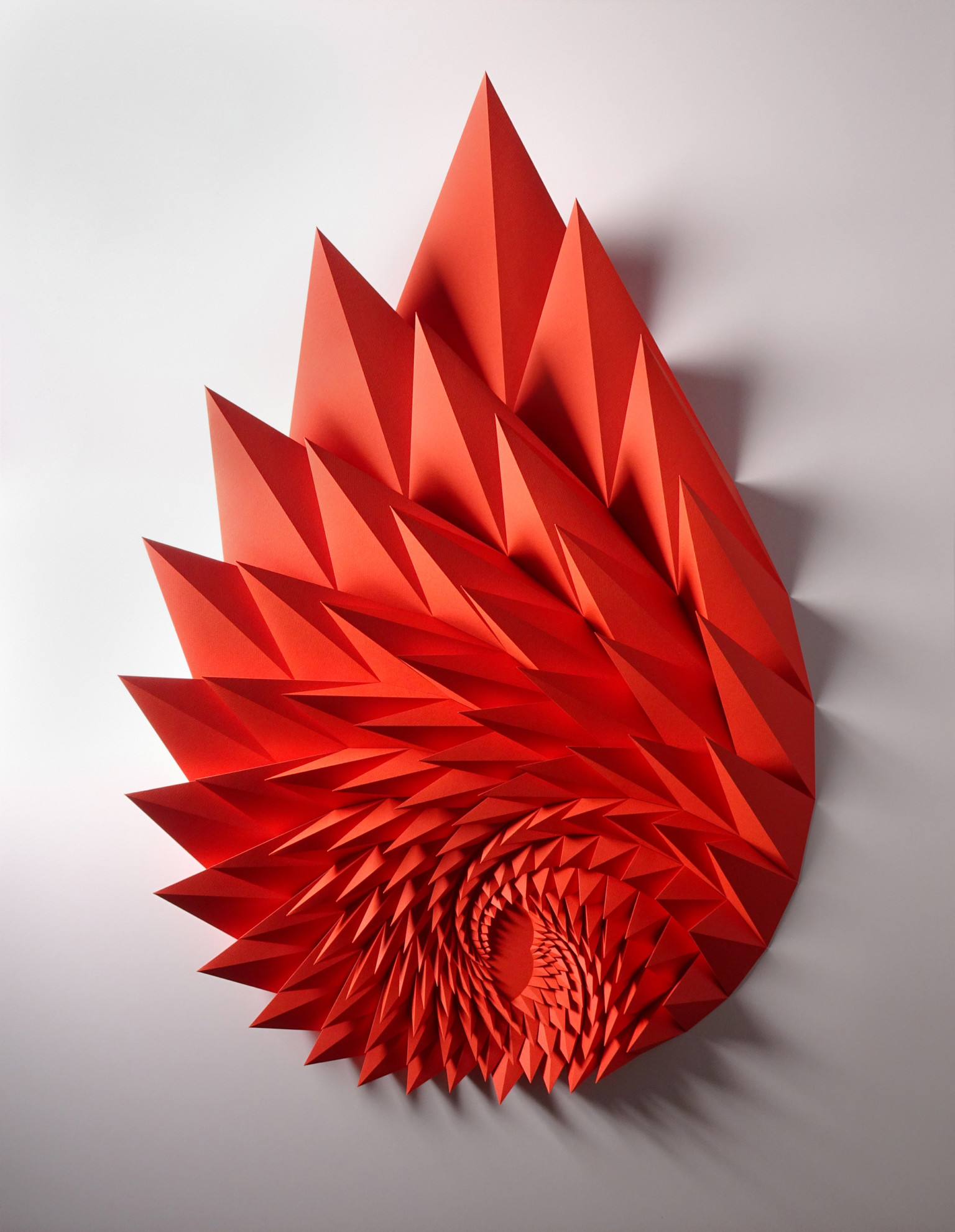 Folded paper sculpture by Matthew Shlian