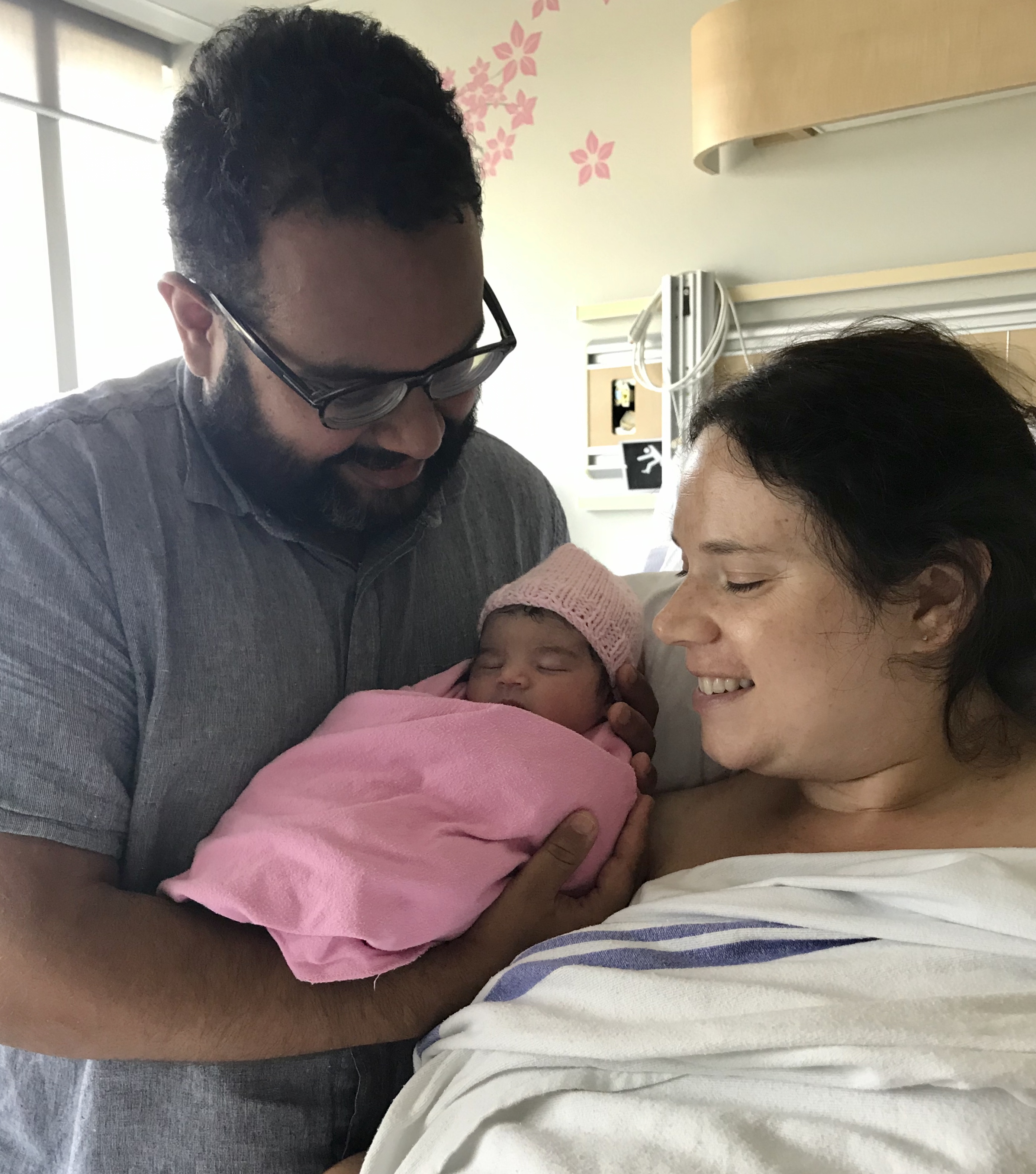 Baby Zoya immediately after birth with mom and dad