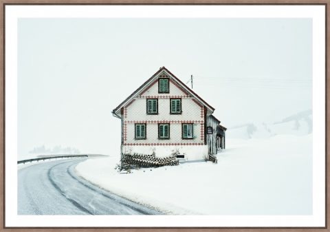 Photo of house in Switzerland in the snow